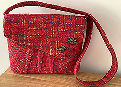 Red tweed messenger bag